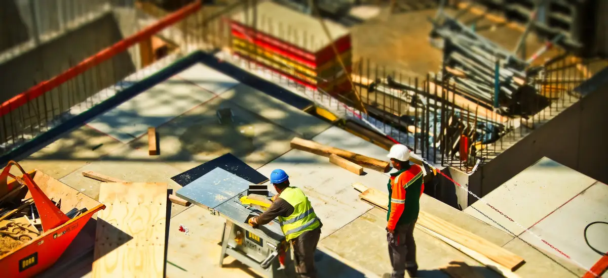 2-man-on-construction-site-during-daytime-159306